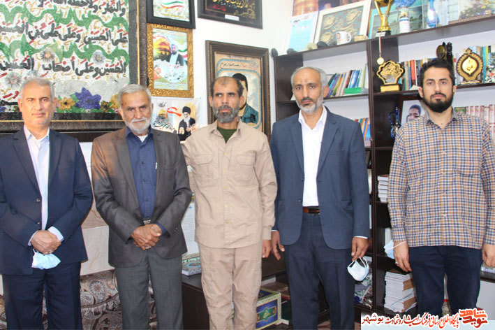 منزل شهید مدافع حرم«محمد احمدی جوان»با پرچم سرخ صاحب کربلا منور شد