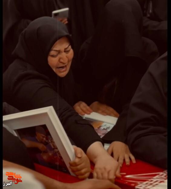 وداع جانسوز مادر با پیکر شهید «جواد مالمیر»